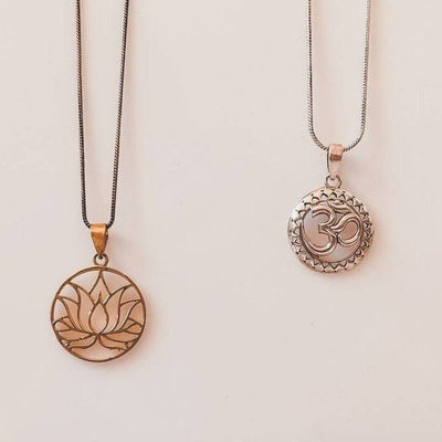 gold-lotus-flower-and-silver-om-necklace.jpg