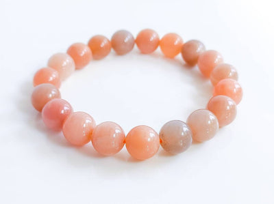 peach-moonstone-crystal-bead-bracelet.jpg