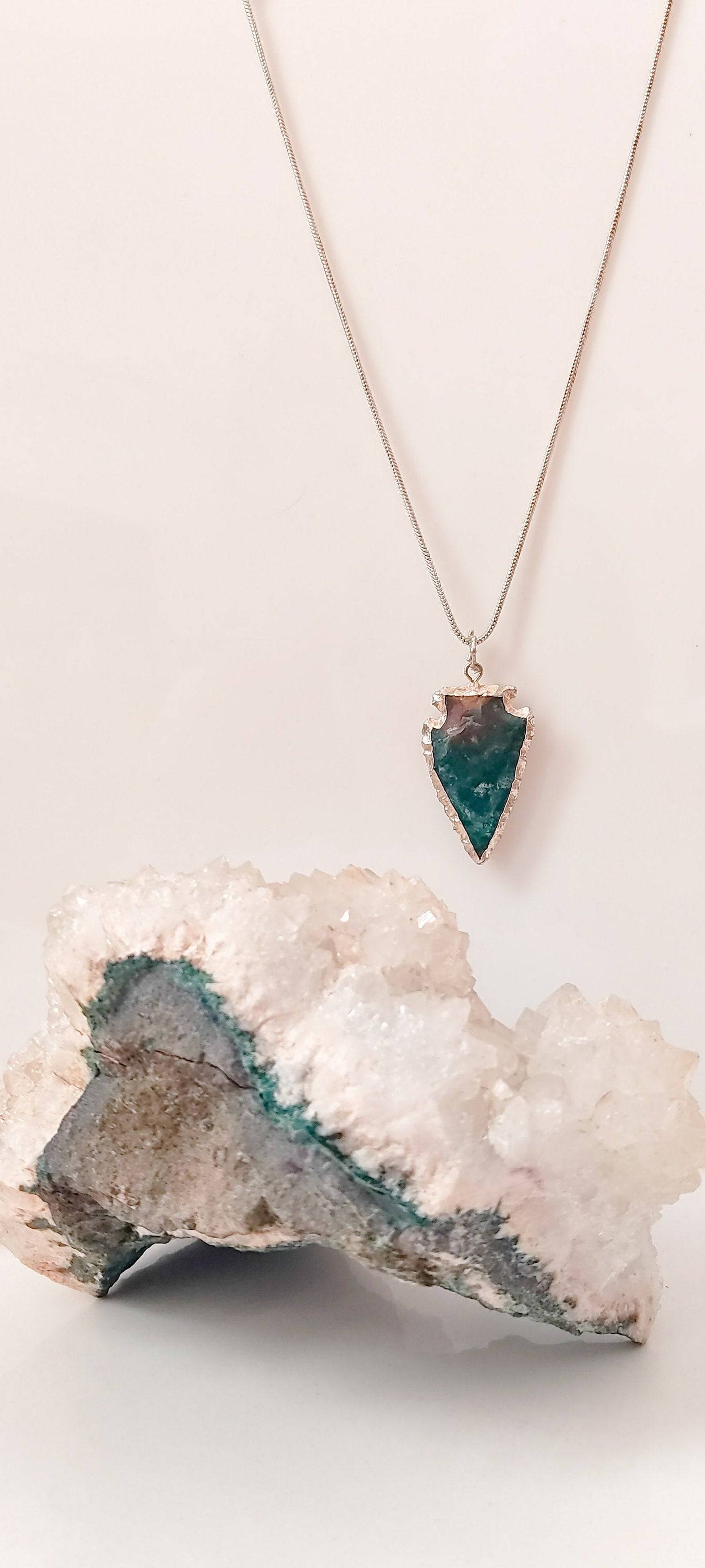 raw-crystal-arrowhead-pendant-necklaces.jpg