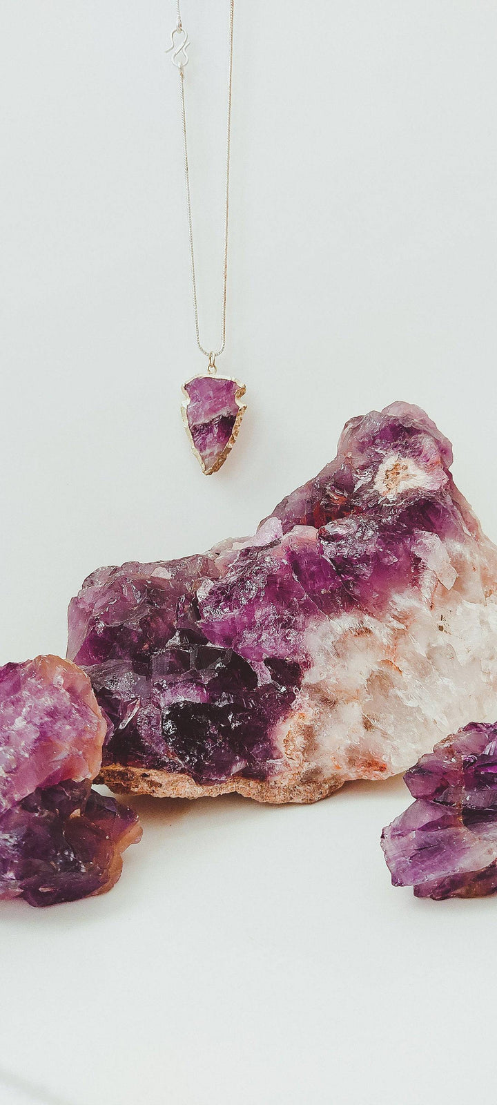 raw-crystal-arrowhead-pendant-necklaces.jpg