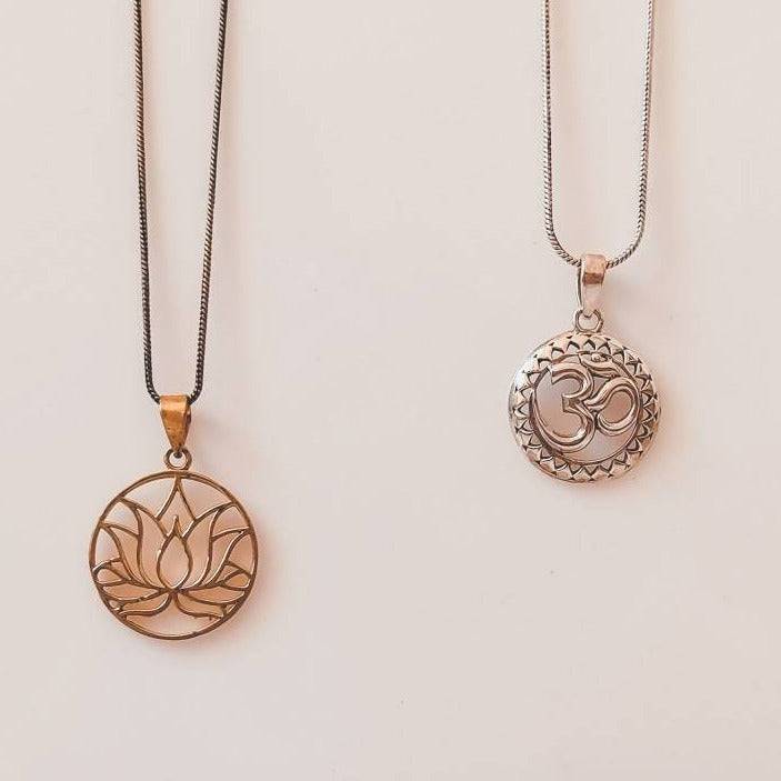 gold-lotus-flower-and-silver-om-necklace.jpg