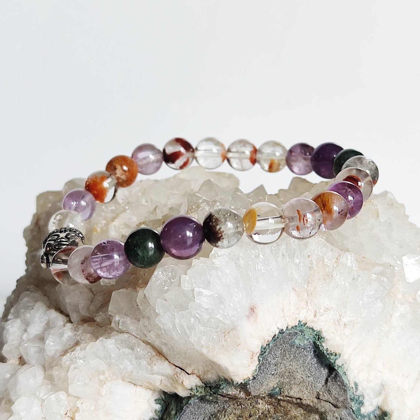 super-seven-crystal-buddha-bracelet.jpg