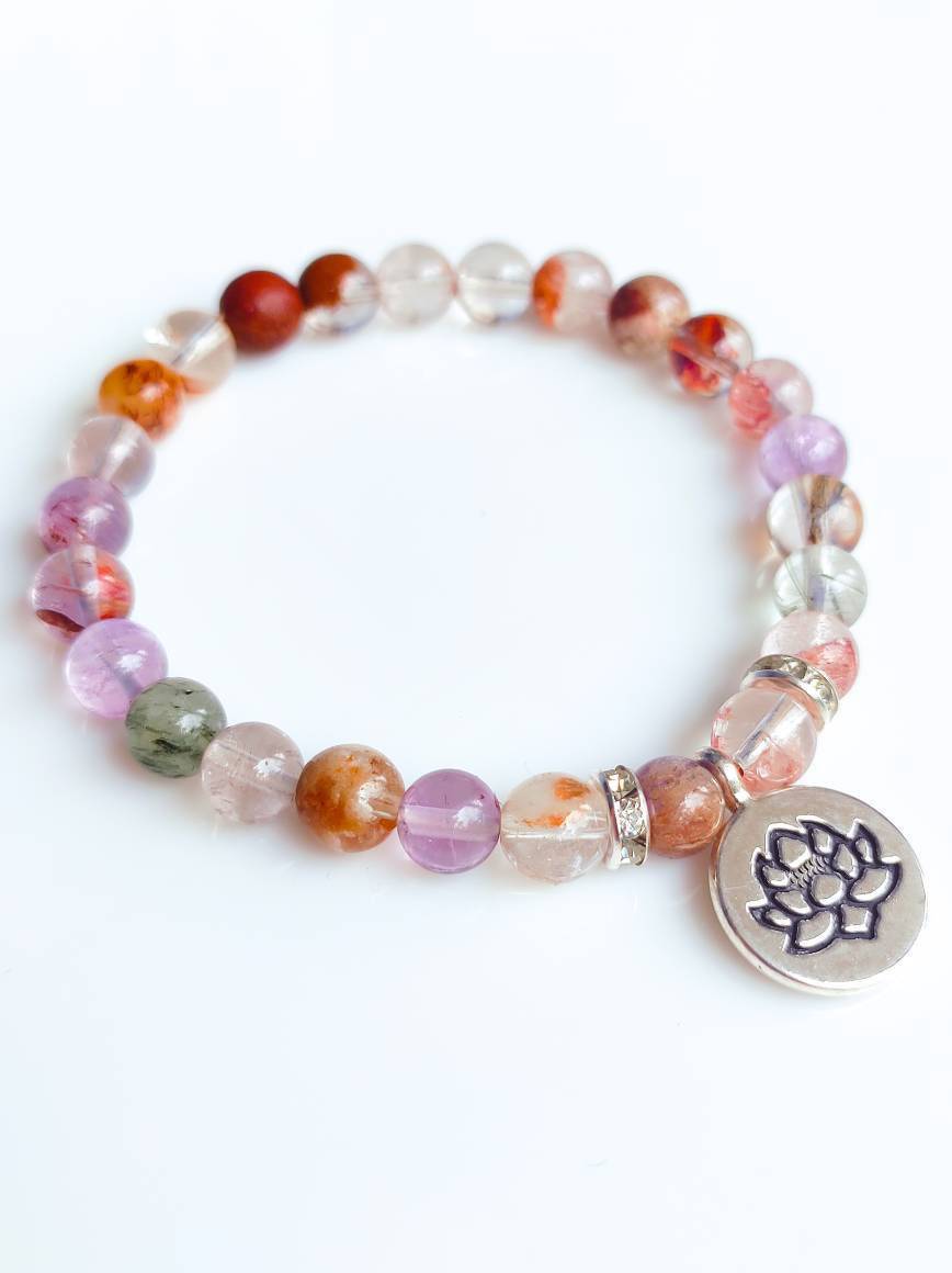 super-seven-crystal-silver-lotus-charm-bracelet.jpg