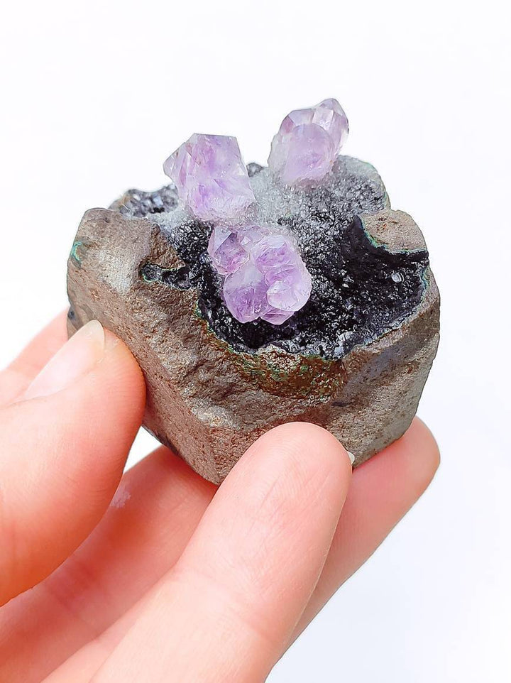 2-5-druzy-amethyst-geode-in-rock-formation.jpg