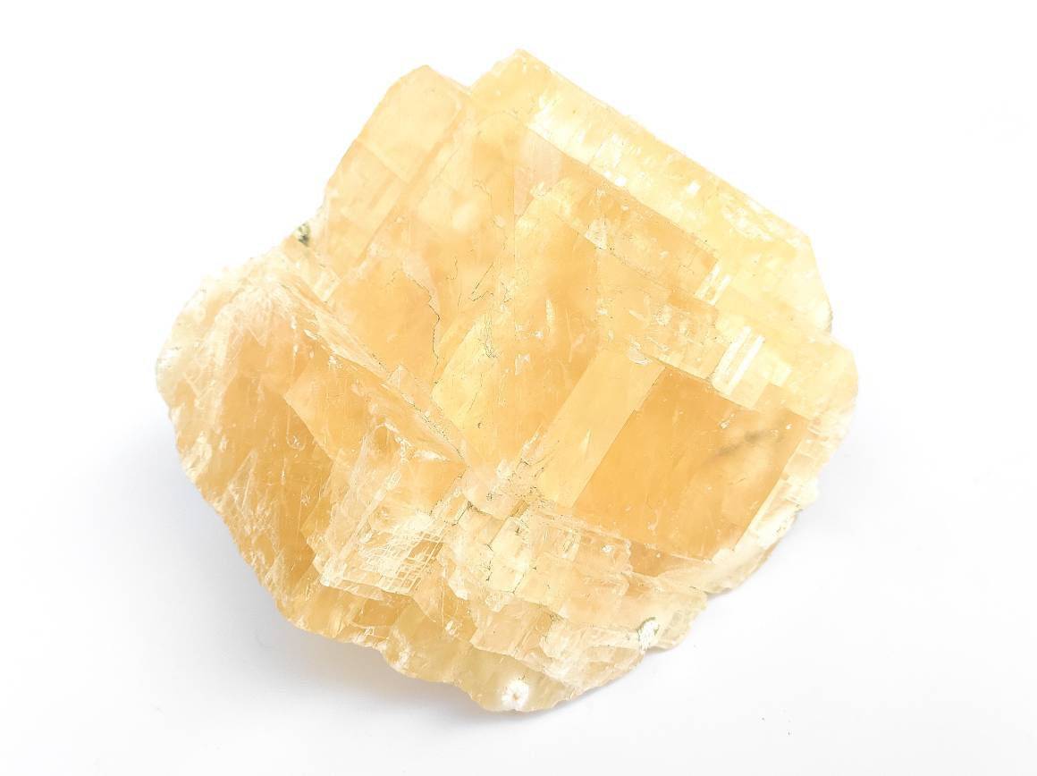 yellow-rhombohedron-optical-honey-calcite-with-rainbows.jpg