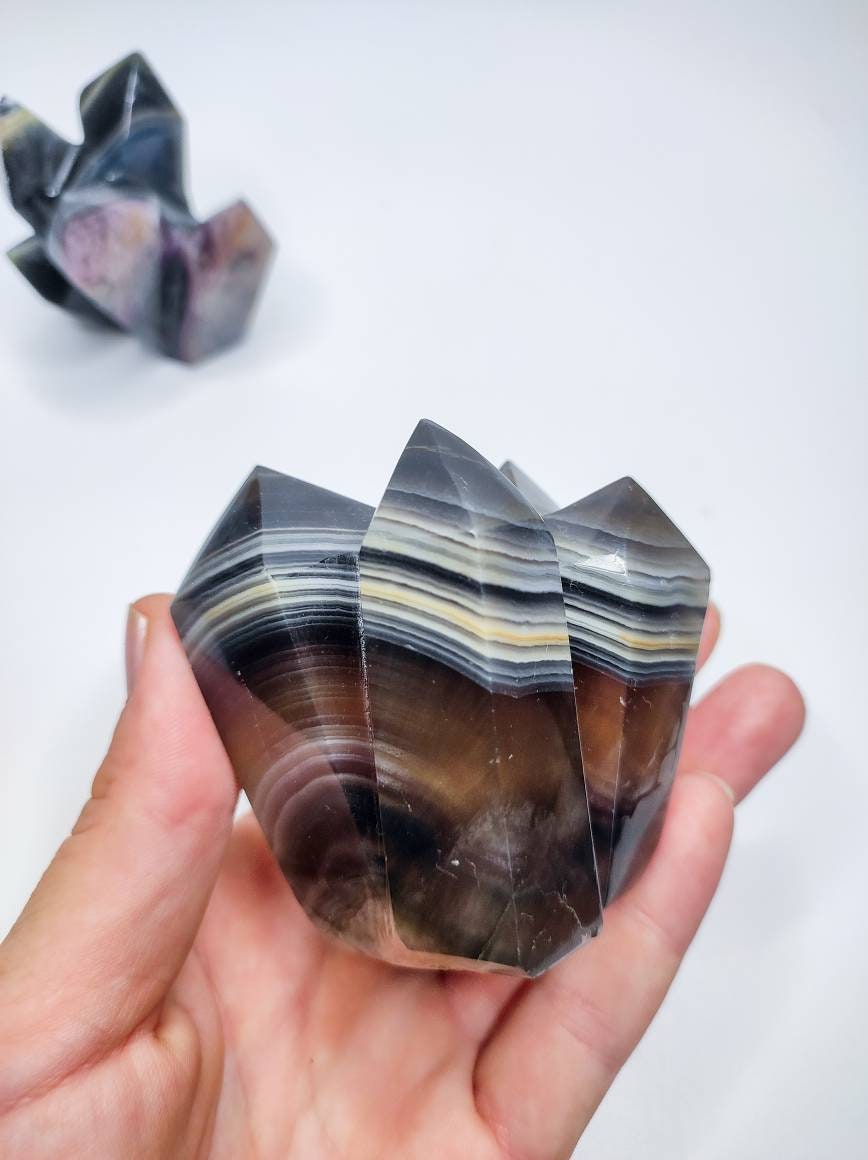 banded-black-onyx-with-amethyst-specimen.jpg