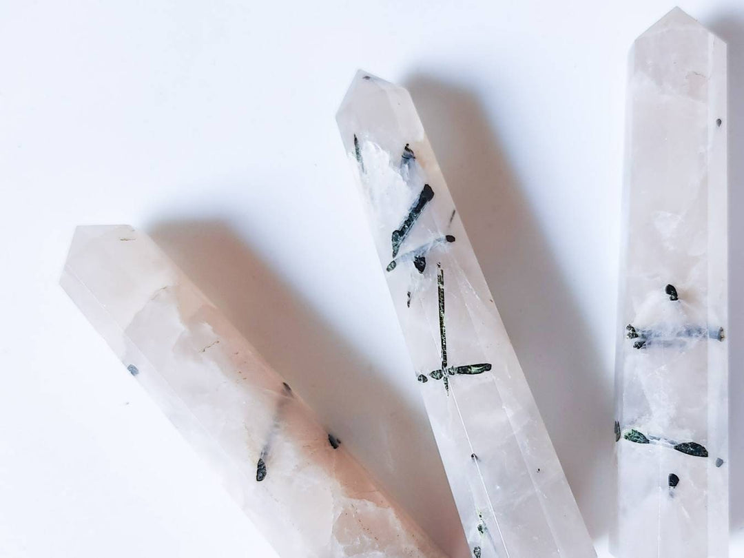 green-tourmaline-in-himalayan-quartz-crystal-obelisk.jpg