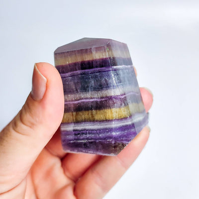 banded-rainbow-fluorite-crystal-specimen.jpg